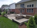 outdoor-living-space-fireplace-kitchen-patio-stairs-retaining-wall