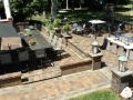 outdoor-living-space-kitchen-patio-retaining-wall-fireplace