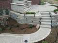outdoor-living-space-stone-retaining-wall-paver-fireplace-patio-2
