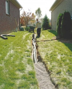 Roof Water and Down Spouts Channeled into French Drain